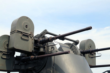military truck with a deadly machine gun on the roof