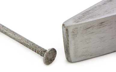 Nagel mit Hammer