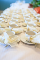 White coffee cups waiting for serving