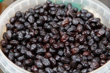 black olives in conserve in a pot from marketplace