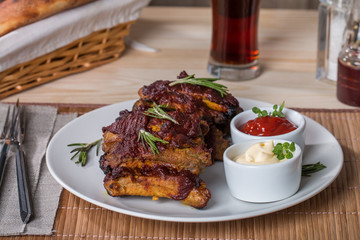Grilled pork ribs in barbecue sauce