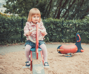 little girl on a playground