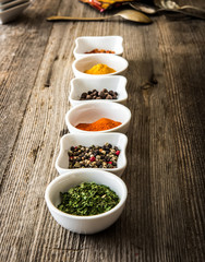 spices in bowls in a row
