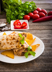 burrito with chips and vegetables