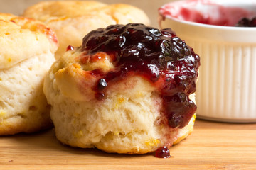 Home made orange english biscuit with blackberry jam.