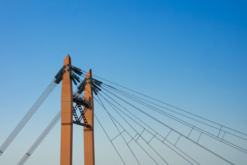 Details of the iron bridge on the blue sky background