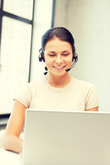 helpline operator with laptop computer