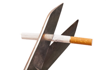 cigarettes with scissors isolated on white background