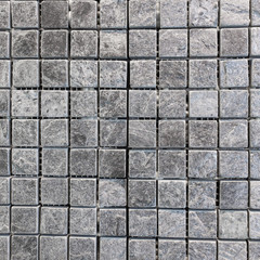 Gray and black tile on the wall texture and backgroud.