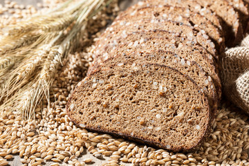 Rye bread with seeds on a wooden table