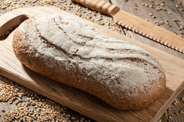 Rye bread with seeds on a cutting board