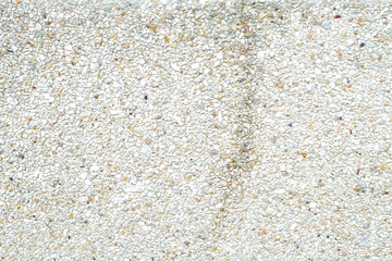 Dirty cement with small stone wall background