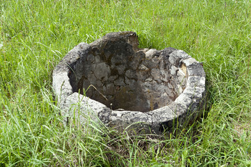 Abandoned concrete old well