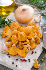 fresh chanterelles and ingredients for cooking, close-up
