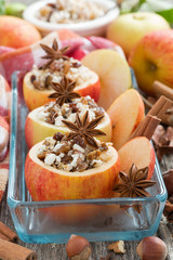prepared for baking stuffed apples in a glass form, vertical