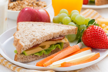 school breakfast with fruits and vegetables, close-up