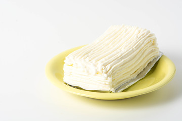 white chocolate cake on green plate