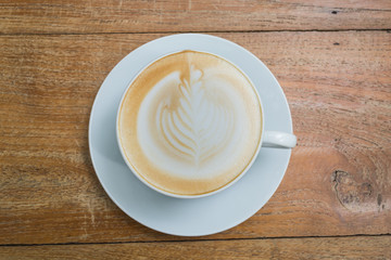 latte on wooden table brown color