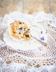 Homemade muffin with blueberry and lavender. Selective focus.