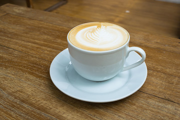 latte on wooden table brown color