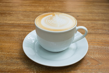 latte on wooden table brown color