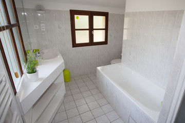 Nicely decorated modern white  washroom,