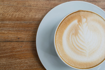 latte on wooden table brown color