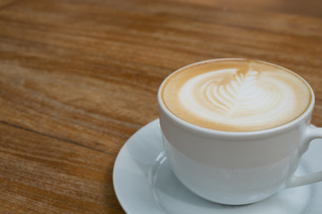 latte on wooden table brown color