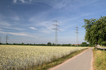 Power Lines / Transmission line on background of blue sky