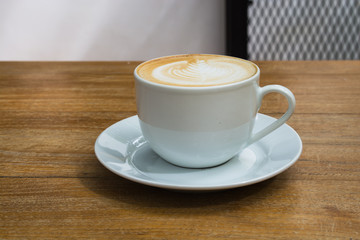 latte on wooden table brown color