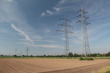 Power Lines / Transmission line on background of blue sky