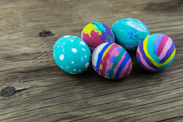 Easter eggs on wooden background. Selective focus.