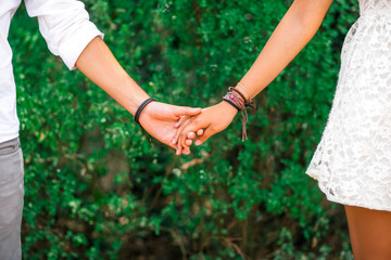 engagement hipster couple is holding hands - 88070459