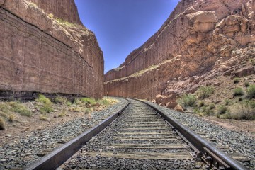 Fototapeta na wymiar Railroad tracks in a canyon near Moab, Utah.