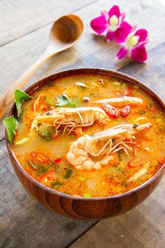 Tom Yam Kung ,thai food in wooden bowl 