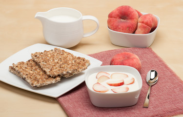 Healthy Breakfast. Fresh Peaches With Low Fat Yogurt. Crisp Brea