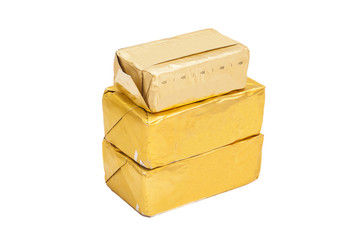 wrapped butter sticks on white background