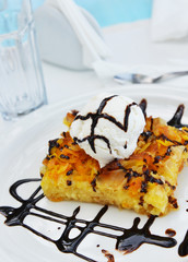 Orange cake with vanilla ice