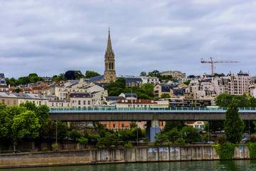 Embankments of Seine River. District Saint-Cloud, Paris, France.