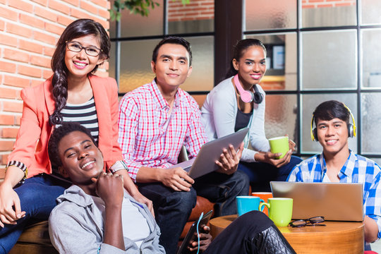 Group Of Diversity College Students Learning On Campus