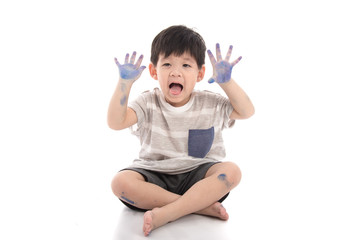 Happy little asian boy with dirty hand