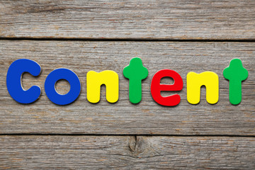 Content word made of colorful magnets
