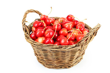 Ripe cherry in basket isolated on white