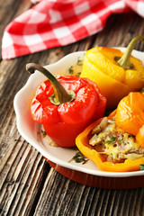 Red and yellow peppers stuffed with meat, rice and vegetables