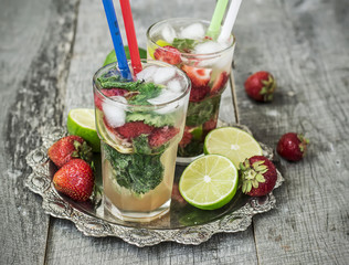 Cocktail Mojito with strawberries - refreshing drink
