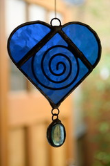 Blue heart made of glass