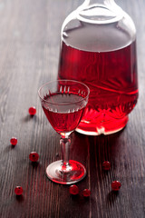 Homemade red wine with red currant berries
