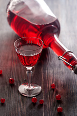 Red wine with red currant berries