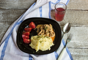 Russian cuisine: mashed potatoes and beef stroganoff