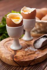 Boiled eggs on a wooden background